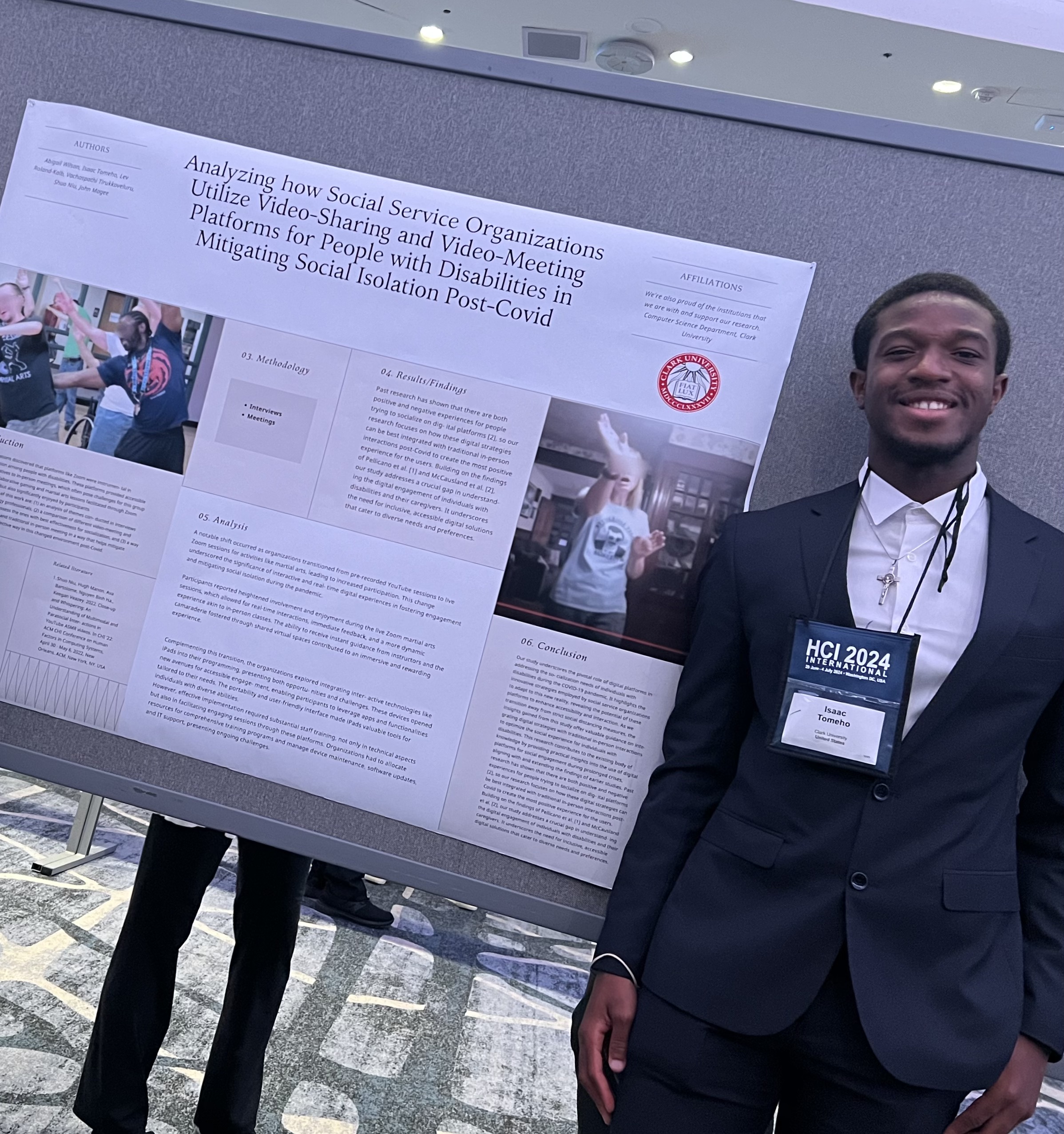 Isaac with poster at HCII 2024